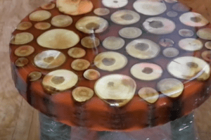 pine log and epoxy resin made chair in a cabin